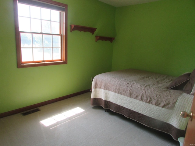 4109 E Woodland Ct, Leesburg, IN 46538 - bedroom featuring carpet flooring and baseboards