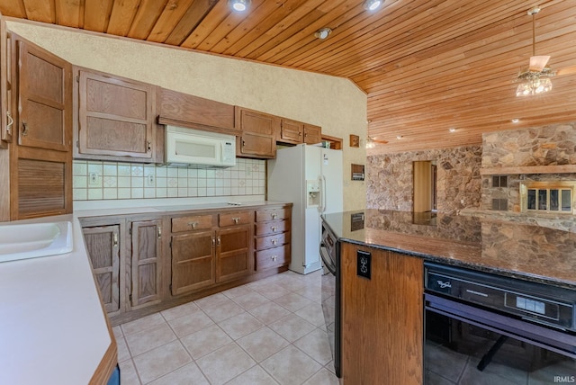 425 E Val Ln, Marion, IN 46952 - kitchen with white appliances, wood ceiling, brown cabinets, decorative backsplash, and light tile patterned flooring