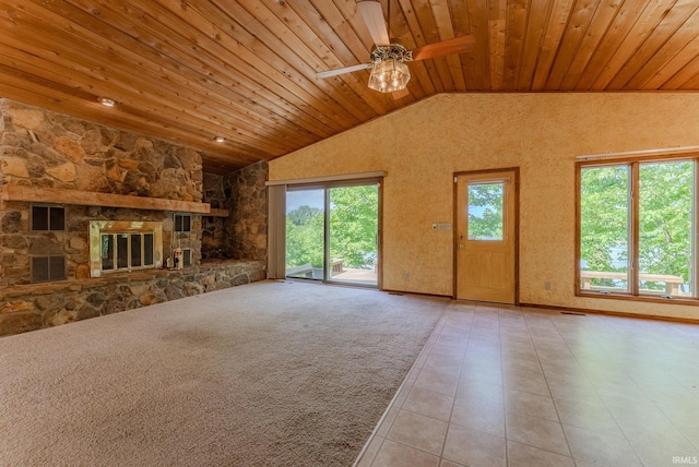 425 E Val Ln, Marion, IN 46952 - unfurnished living room featuring wood ceiling, lofted ceiling, a ceiling fan, a fireplace, and tile patterned flooring