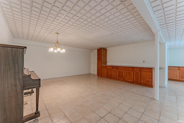 425 E Val Ln, Marion, IN 46952 - spare room featuring a chandelier