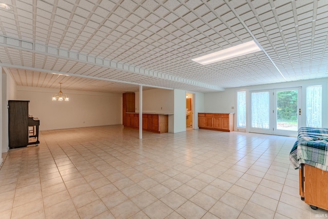 425 E Val Ln, Marion, IN 46952 - unfurnished living room featuring a chandelier