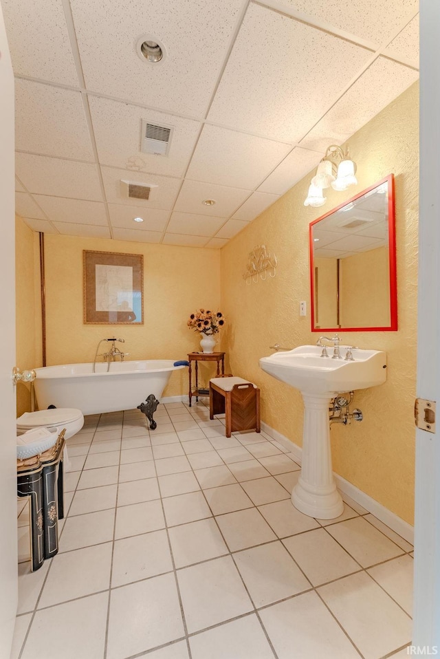425 E Val Ln, Marion, IN 46952 - bathroom featuring a drop ceiling, a soaking tub, and tile patterned flooring