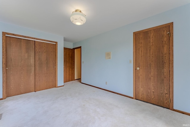 425 E Val Ln, Marion, IN 46952 - unfurnished bedroom featuring light carpet and a closet