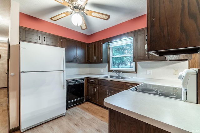 9246 Fritz Rd, Fort Wayne, IN 46818 - kitchen with freestanding refrigerator, dishwasher, white range with electric stovetop, dark brown cabinets, and light wood-style floors