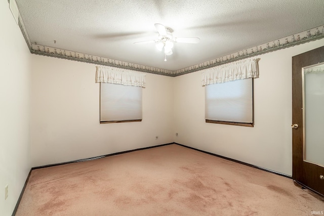 9246 Fritz Rd, Fort Wayne, IN 46818 - carpeted spare room featuring ceiling fan and a textured ceiling
