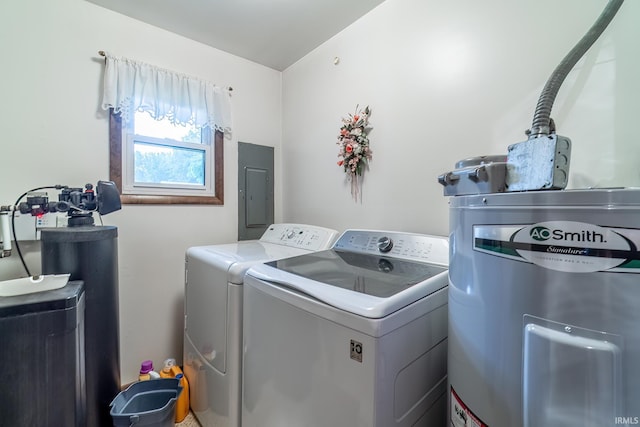 9246 Fritz Rd, Fort Wayne, IN 46818 - laundry room with electric panel, water heater, and washing machine and clothes dryer