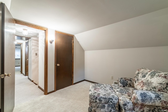 9246 Fritz Rd, Fort Wayne, IN 46818 - living area featuring light colored carpet and lofted ceiling