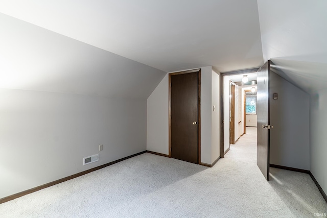 9246 Fritz Rd, Fort Wayne, IN 46818 - additional living space featuring light carpet and lofted ceiling