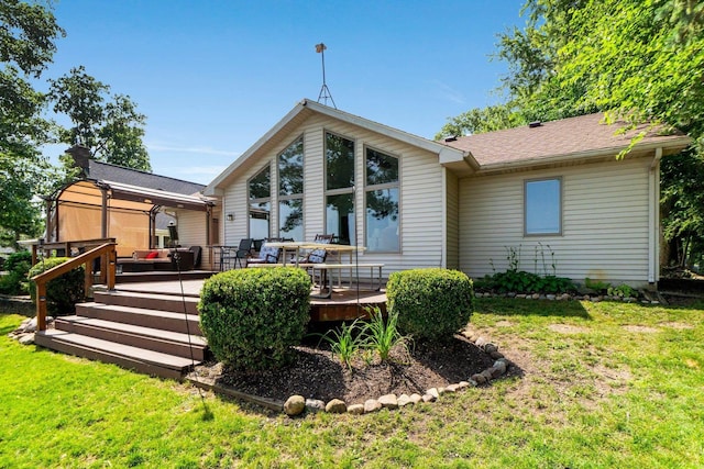 3139 E Colony Ave, Columbia City, IN 46725 - back of house featuring a lawn and a wooden deck