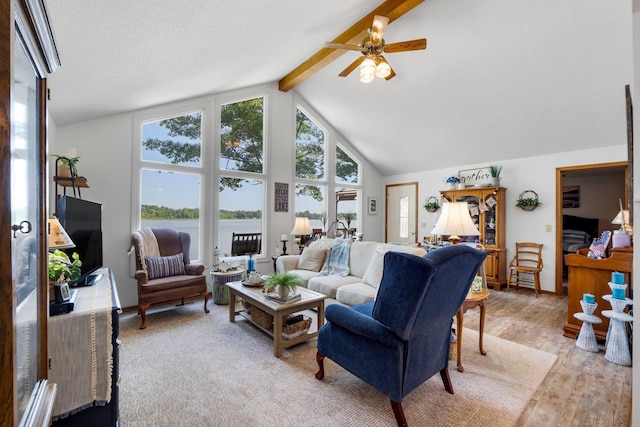 3139 E Colony Ave, Columbia City, IN 46725 - living area featuring beamed ceiling, ceiling fan, high vaulted ceiling, and light wood finished floors