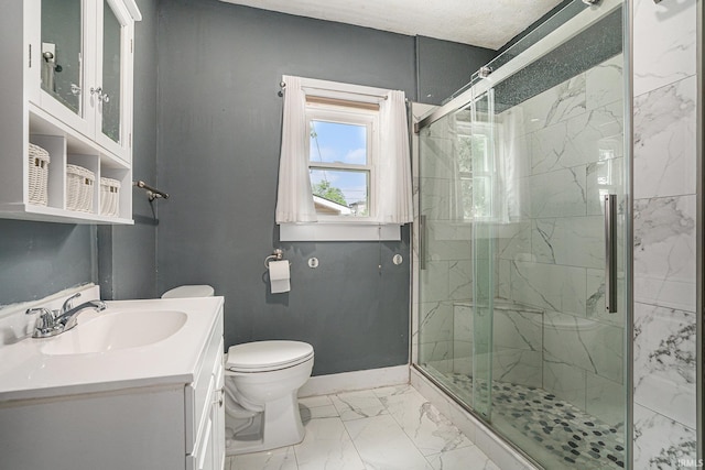 240 Bank St, Elkhart, IN 46516 - bathroom with a marble finish shower, vanity, and marble look tile flooring