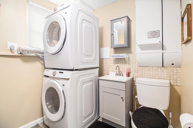 3301 Cabot Dr, South Bend, IN 46635 - laundry area featuring estacked washer and dryer