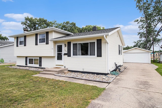 3301 Cabot Dr, South Bend, IN 46635 - tri-level home featuring a chimney, a garage, an outbuilding, a front lawn, and roof with shingles