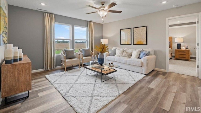 1185 Catesby Ct, Fort Wayne, IN 46818 - living area featuring a ceiling fan, wood finished floors, and recessed lighting