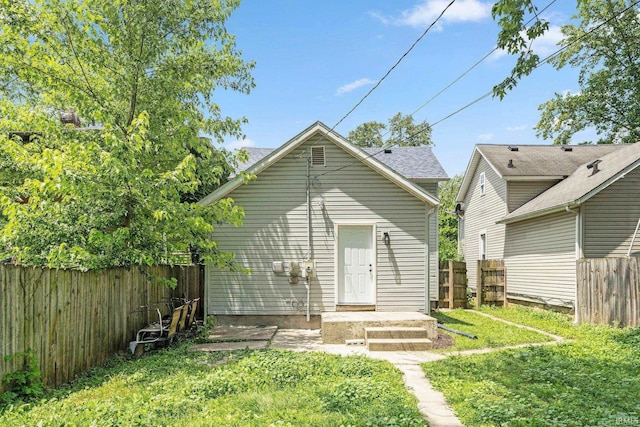 2725 Fox Ave, Fort Wayne, IN 46807 - back of house with a fenced backyard
