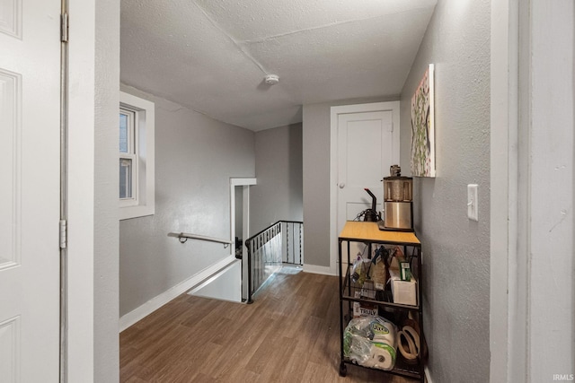 919 S 18th St, Lafayette, IN 47905 - corridor with an upstairs landing, wood finished floors, and a textured ceiling