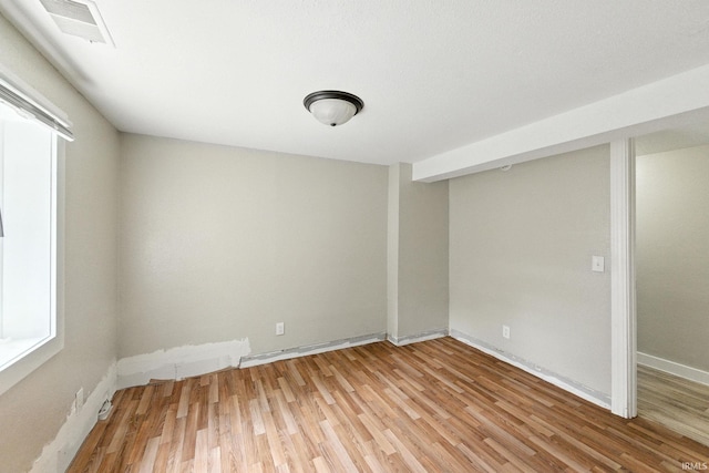 919 S 18th St, Lafayette, IN 47905 - spare room featuring light wood-style flooring and baseboards