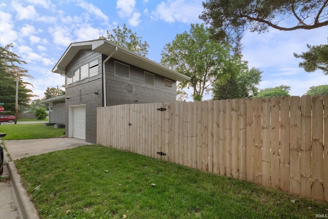 919 S 18th St, Lafayette, IN 47905 - view of home's exterior featuring an attached garage and driveway