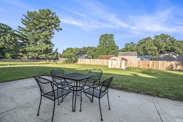56435 Eastlea Dr, South Bend, IN 46619 - fenced backyard with a patio area and outdoor dining area