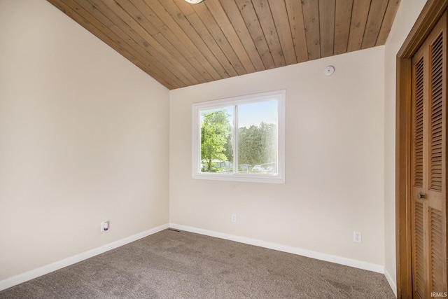 56435 Eastlea Dr, South Bend, IN 46619 - unfurnished bedroom with vaulted ceiling, carpet, a closet, and wood ceiling