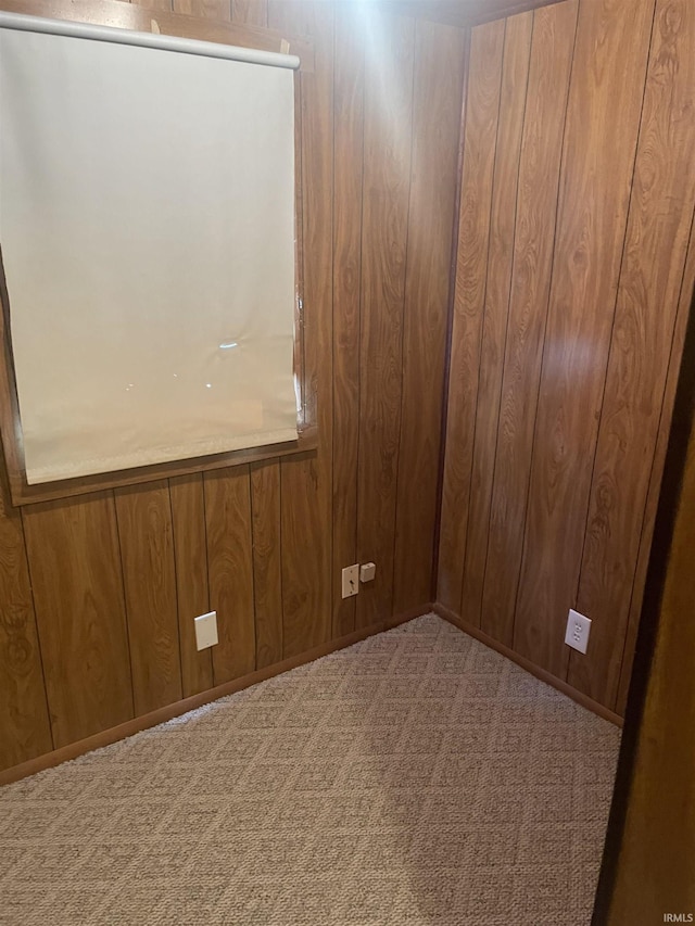 517 S Main St, Jonesboro, IN 46938 - unfurnished room featuring wood walls and carpet floors