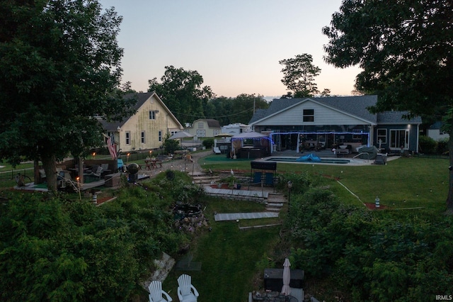 506 N Beech Rd, Osceola, IN 46561 - view of grassy yard featuring a patio