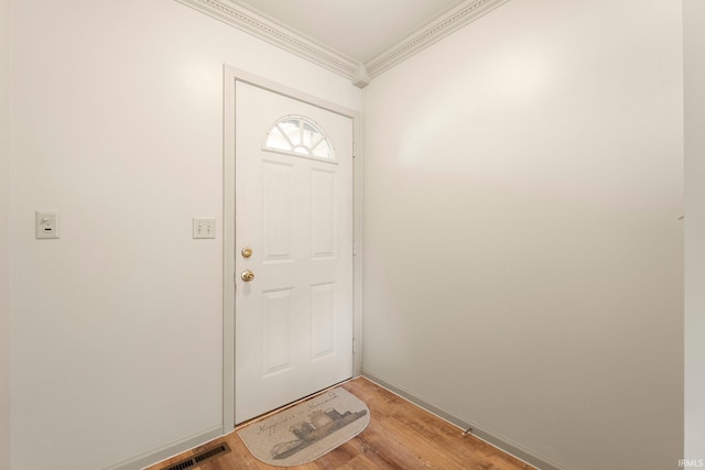 1408 Duesenberg Dr, Auburn, IN 46706 - entryway with ornamental molding and light wood-type flooring