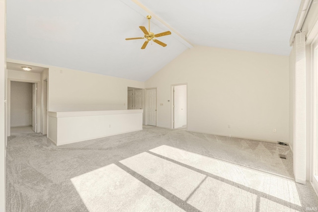 1408 Duesenberg Dr, Auburn, IN 46706 - spare room featuring a ceiling fan, carpet, beam ceiling, and high vaulted ceiling
