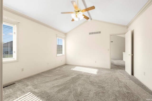 1408 Duesenberg Dr, Auburn, IN 46706 - carpeted empty room featuring a ceiling fan, crown molding, and vaulted ceiling