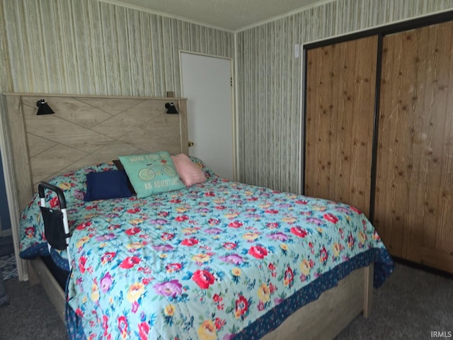 1723 W Timberview Dr, Marion, IN 46952 - carpeted bedroom with wallpapered walls, ornamental molding, and a closet
