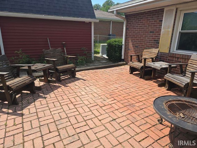 1723 W Timberview Dr, Marion, IN 46952 - view of patio / terrace with a fire pit