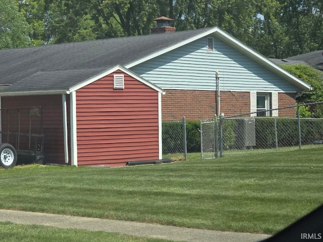 1723 W Timberview Dr, Marion, IN 46952 - view of home's exterior featuring a chimney and brick siding
