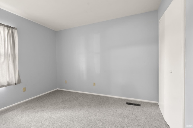 415 Grapevine Ln, Fort Wayne, IN 46825 - empty room featuring carpet floors and baseboards