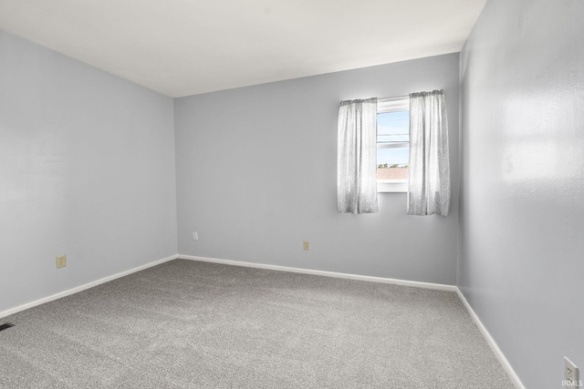 415 Grapevine Ln, Fort Wayne, IN 46825 - empty room featuring carpet flooring and baseboards