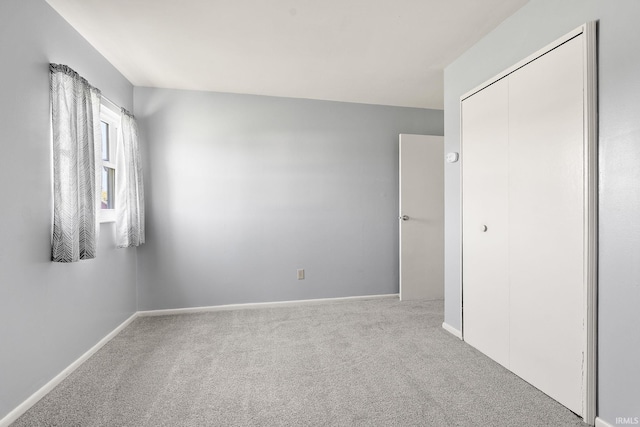 415 Grapevine Ln, Fort Wayne, IN 46825 - unfurnished bedroom with carpet floors and a closet