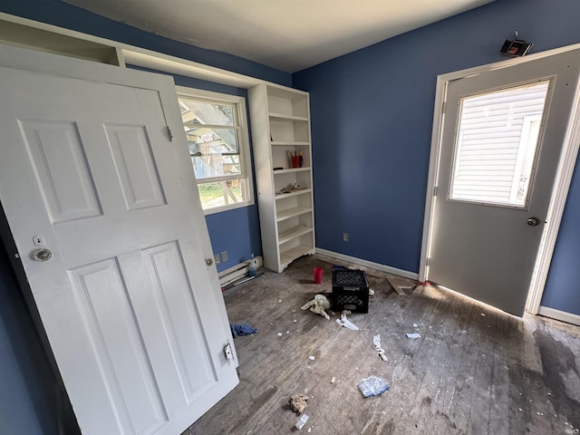 325 W Linden Ave, Logansport, IN 46947 - entryway with wood finished floors and baseboards