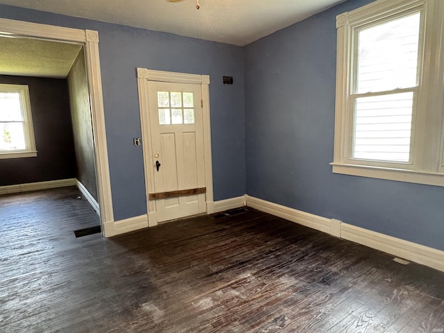 325 W Linden Ave, Logansport, IN 46947 - foyer entrance with wood finished floors and baseboards