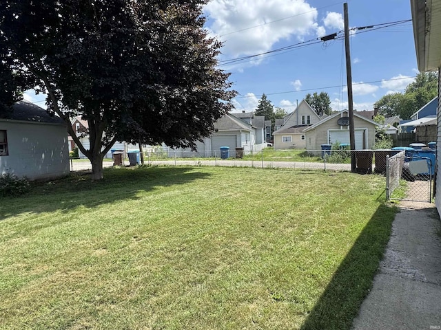325 W Linden Ave, Logansport, IN 46947 - view of yard with a garage and a residential view