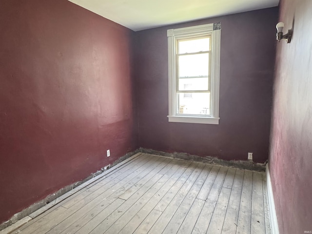 325 W Linden Ave, Logansport, IN 46947 - empty room with hardwood / wood-style flooring