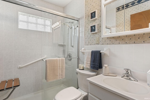 4026 Brookton Dr, South Bend, IN 46614 - bathroom with tile walls, a shower stall, and vanity