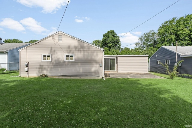 4026 Brookton Dr, South Bend, IN 46614 - back of house featuring a patio and a lawn