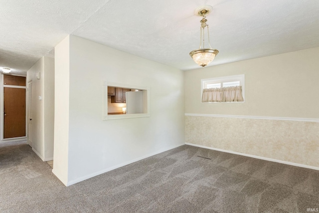 4026 Brookton Dr, South Bend, IN 46614 - carpeted empty room with a textured ceiling and baseboards
