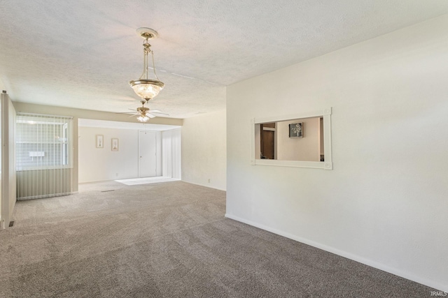 4026 Brookton Dr, South Bend, IN 46614 - carpeted empty room featuring a ceiling fan and a textured ceiling