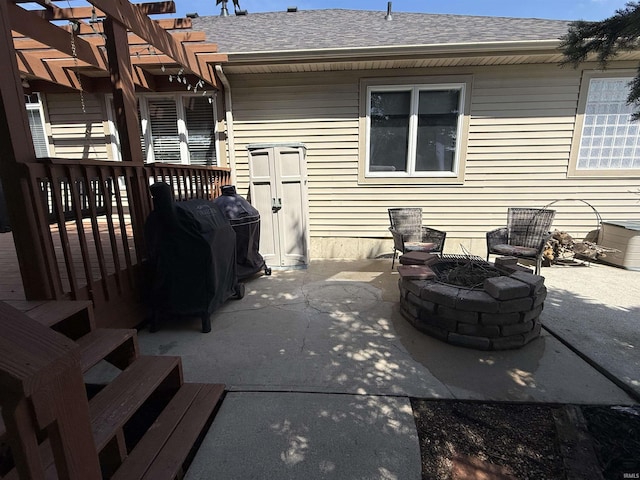 9825 Tamar Trl, Fort Wayne, IN 46825 - view of patio featuring a pergola and an outdoor fire pit