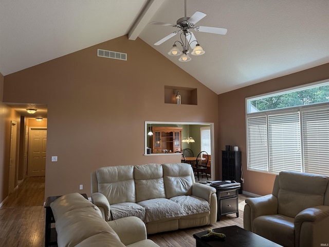 9825 Tamar Trl, Fort Wayne, IN 46825 - living room featuring high vaulted ceiling, wood finished floors, a ceiling fan, and beam ceiling