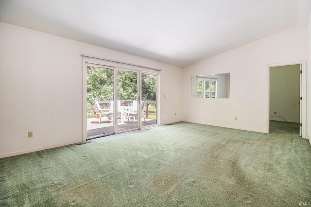 1983 Greenock St, South Bend, IN 46614 - unfurnished room with lofted ceiling, healthy amount of natural light, and carpet flooring