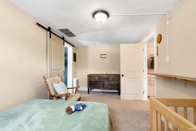 1313 Tecumseh St, Fort Wayne, IN 46805 - bedroom with light carpet and a barn door