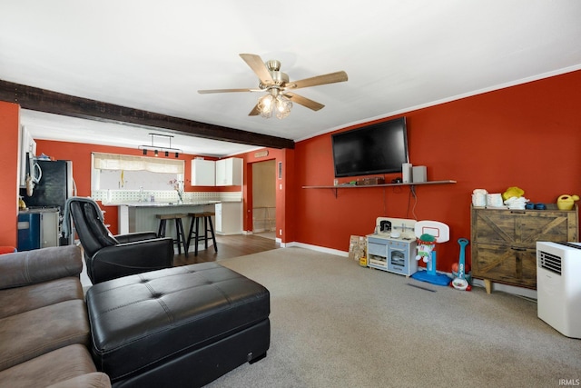 1313 Tecumseh St, Fort Wayne, IN 46805 - living room with ceiling fan, light colored carpet, and beamed ceiling