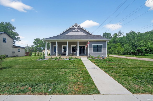 1229 Corby Blvd, South Bend, IN 46617 - view of front of house with covered porch and a front yard