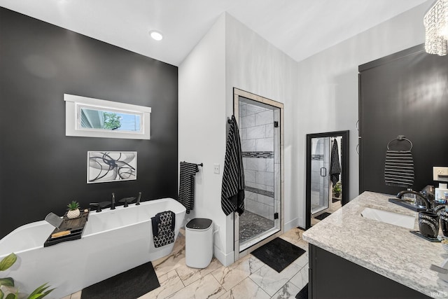 1229 Corby Blvd, South Bend, IN 46617 - bathroom featuring marble look tiles, a stall shower, a freestanding bath, and vanity